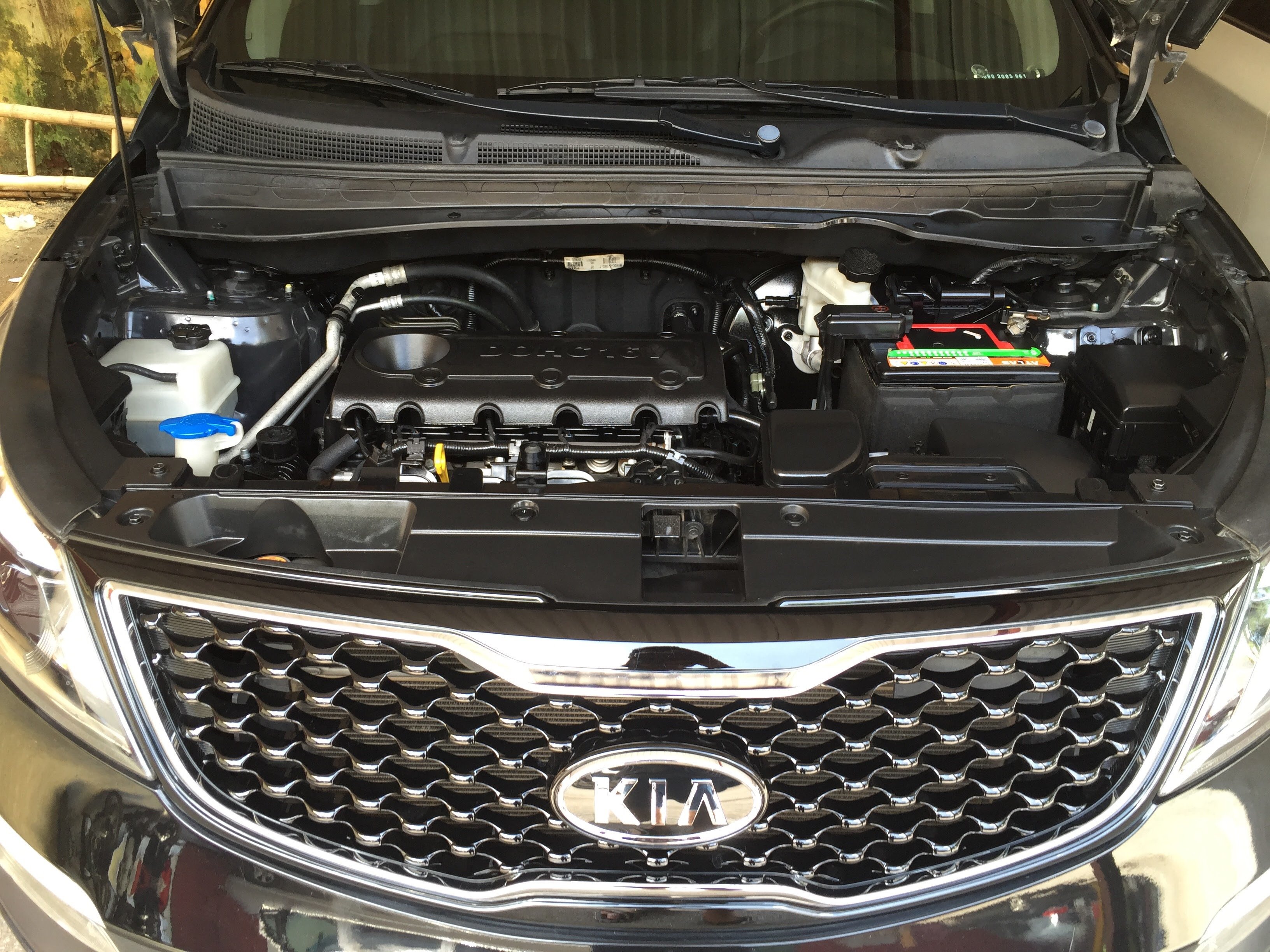 thay ắc quy xe Kia Sportage